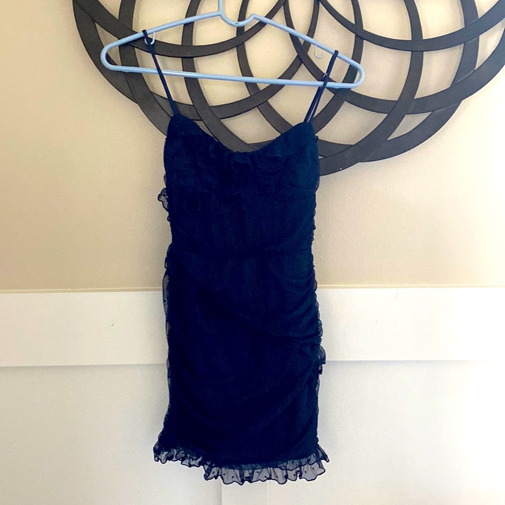 Brand new homecoming dress, not worn. Doesn’t fit. Navy blue Lucy in the Sky